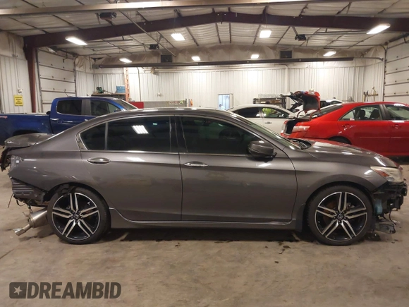 2016 Honda Accord Touring with VIN 1HGCR3F92GA029435, listed as a IAAI auction lot 42180794 with 132,658 mi miles and . Bid and sale history available at DreamBid. Image 14.