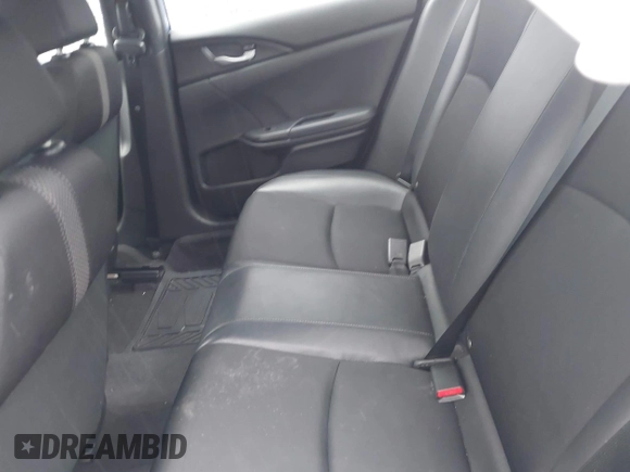 2021 Honda Civic Sport with VIN 2HGFC2F87MH554620, listed as a IAAI auction lot 41743596 with 52,327 mi miles and . Bid and sale history available at DreamBid. Image 8.