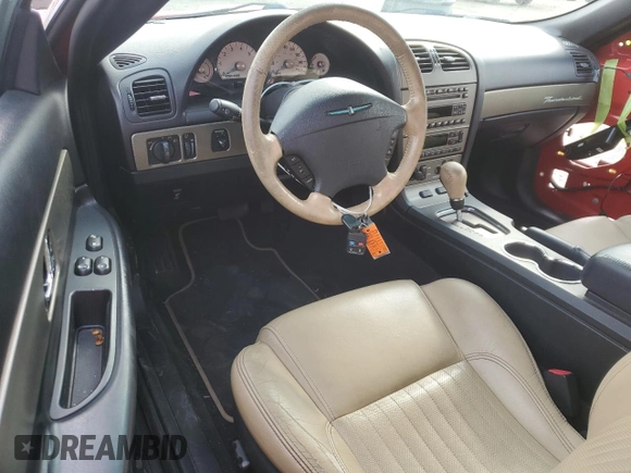 2005 Ford Thunderbird Deluxe z VIN 1FAHP60A05Y102875, wystawiony jako Copart lot #81070624 z przebiegiem 84 260 mil mil oraz Szkoda całkowita • Salvage title. Historia ofert i sprzedaży dostępna na DreamBid. Obrazek 8.