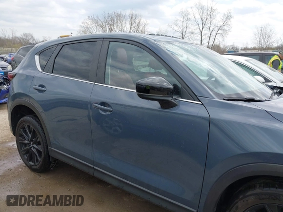 2022 Mazda CX-5 S Preferred with VIN JM3KFBCM2N0528204, listed as a IAAI auction lot 42054842 with 32,066 mi miles and . Bid and sale history available at carsss.com. Image 13.