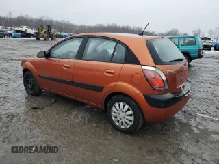 2009 Kia Rio LX with VIN KNADE243396530327, listed as a Copart auction lot 44631785 with 123,170 mi miles and Salvage Title. Bid and sale history available at carsss.com. Image 2.