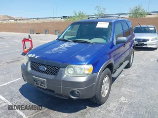 2005 Ford Escape XLT with VIN 1FMYU03155KB63374, listed as a IAAI auction lot 42739496 with 128,768 mi miles and . Bid and sale history available at DreamBid. Image 2.