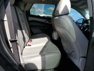 2013 Cadillac SRX Performance Collection with VIN 3GYFNHE37DS649235, listed as a Copart auction lot 56939285 with 104,692 mi miles and Salvage title. Bid and sale history available at DreamBid. Image 11.