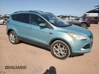 2013 Ford Escape SE with VIN 1FMCU0GXXDUB22217, listed as a Copart auction lot 58698375 with 143,889 mi miles and Clean title. Bid and sale history available at DreamBid. Image 4.