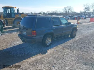 1998 Mercury Mountaineer with VIN 4M2ZU55P3WUJ17243, listed as a IAAI auction lot 41658097 with 219,464 mi miles. Bid and sale history available at carsss.com. Image 4.