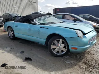2002 Ford Thunderbird Hardtop Premium z VIN 1FAHP60A52Y128979, wystawiony jako Copart lot #68105854 z przebiegiem 58 146 mil mil oraz Nie do naprawy • Non repairable. Historia ofert i sprzedaży dostępna na DreamBid. Obrazek 4.