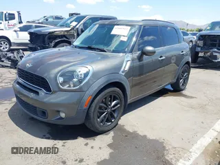 2014 MINI Countryman S with VIN WMWZC3C59EWP29137, listed as a IAAI auction lot 42661922 with 128,064 mi miles and . Bid and sale history available at DreamBid. Image 17.