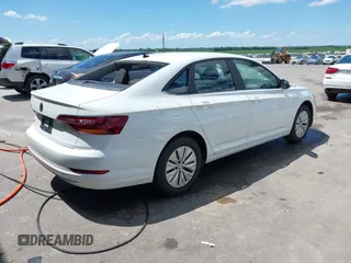 2019 Volkswagen Jetta S z VIN 3VWC57BU7KM200586, wystawiony jako IAAI lot #42609606 z przebiegiem 72 874 mil mil oraz . Historia ofert i sprzedaży dostępna na DreamBid. Obrazek 4.