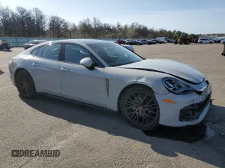 2023 Porsche Panamera z VIN WP0AJ2A79PL101328, wystawiony jako Copart lot #55093015 z przebiegiem 26 927 mil mil oraz Szkody całkowita. Historia ofert i sprzedaży dostępna na DreamBid. Obrazek 4.
