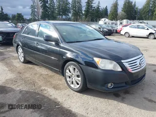 2010 Toyota Avalon XL with VIN 4T1BK3DB1AU356186, listed as a IAAI auction lot 41704838 with 150,462 mi miles and . Bid and sale history available at carsss.com. Image 1.