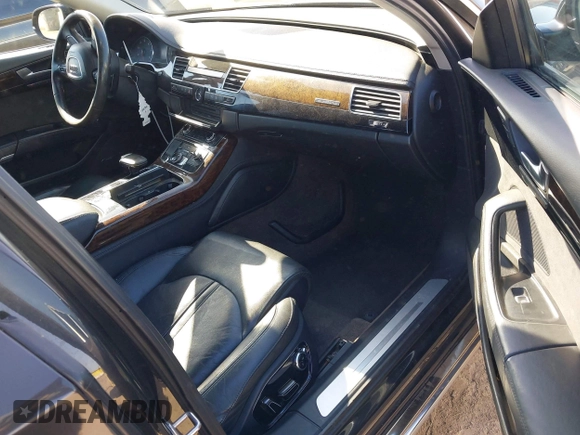 2011 Audi A8 with VIN WAURVAFD9BN014362, listed as a IAAI auction lot 41960366 with 135,244 mi miles and . Bid and sale history available at DreamBid. Image 5.