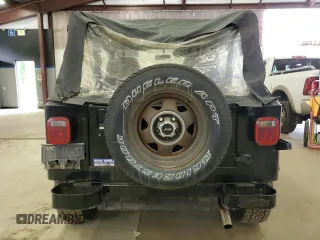 1993 Jeep Wrangler S with VIN 1J4FY19P9PP227563, listed as a Copart auction lot 60095405 with 166,851 mi miles and Clean title. Bid and sale history available at DreamBid. Image 6.