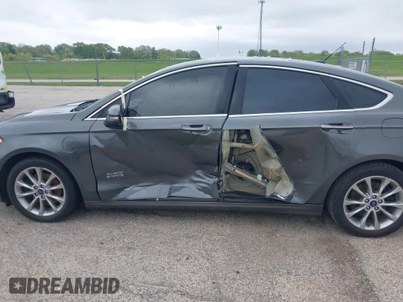 2017 Ford Fusion Energi SE with VIN 3FA6P0PU9HR227932, listed as a IAAI auction lot 42177500 with 106,938 mi miles. Bid and sale history available at carsss.com. Image 6.