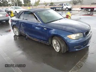 2010 BMW 1 Series 128i with VIN WBAUL7C58AVJ77695, listed as a IAAI auction lot 41938031 with Not Provided miles and . Bid and sale history available at carsss.com. Image 1.