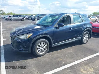 2016 Mazda CX-5 Sport with VIN JM3KE2BY3G0740488, listed as a IAAI auction lot 42000449 with 43,009 mi miles. Bid and sale history available at carsss.com. Image 2.