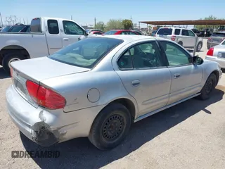 2004 Oldsmobile Alero GX z VIN 1G3NK52F64C145059, wystawiony jako IAAI lot #42239408 z przebiegiem 144 422 mil mil oraz . Historia ofert i sprzedaży dostępna na DreamBid. Obrazek 4.