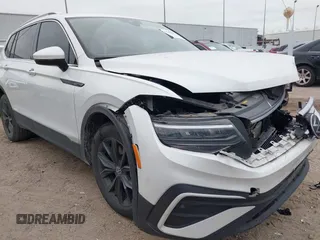 2023 Volkswagen Tiguan SE with VIN 3VVNB7AX8PM099759, listed as a IAAI auction lot 41340885 with 28,562 mi miles and . Bid and sale history available at DreamBid. Image 17.