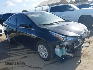 2020 Toyota Prius L Eco z VIN JTDKARFU6L3104385, wystawiony jako IAAI lot #41922029 z przebiegiem 123 235 mil mil oraz . Historia ofert i sprzedaży dostępna na DreamBid. Obrazek 1.