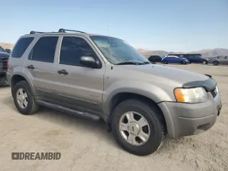2001 Ford Escape XLT with VIN 1FMCU03131KB27591, listed as a Copart auction lot 66605904 with 167,094 mi miles and Salvage Title. Bid and sale history available at carsss.com. Image 4.