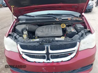 2014 Dodge Grand Caravan SXT with VIN 2C4RDGCG4ER120877, listed as a IAAI auction lot 42142083 with 199,895 mi miles and . Bid and sale history available at DreamBid. Image 10.