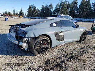 2021 Audi R8 V10 z VIN WUABAAFX8M7900919, wystawiony jako Copart lot #44812725 z przebiegiem 21 390 mil mil oraz Szkoda całkowita • Salvage title. Historia ofert i sprzedaży dostępna na DreamBid. Obrazek 3.