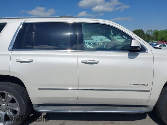 2015 GMC Yukon Denali with VIN 1GKS1CKJ3FR230797, listed as a IAAI auction lot 41977294 with 174,633 mi miles. Bid and sale history available at carsss.com. Image 13.