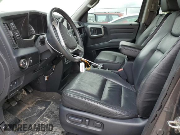 2011 Honda Ridgeline RTL with VIN 5FPYK1F52BB009042, listed as a Copart auction lot 69439004 with 119,889 mi miles and Salvage Title. Bid and sale history available at carsss.com. Image 7.
