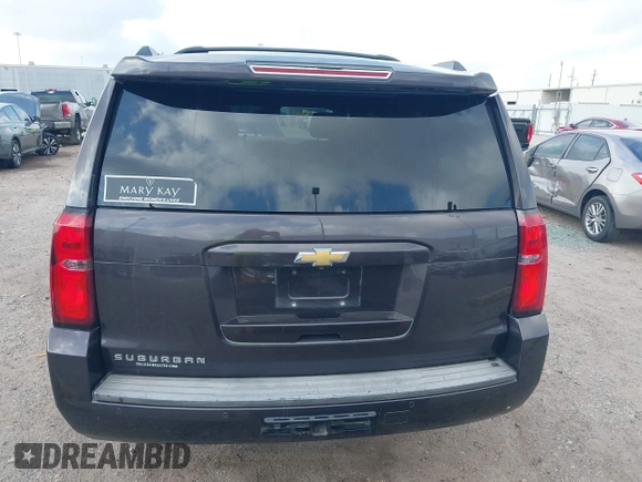 2015 Chevrolet Suburban LT with VIN 1GNSCJKCXFR175154, listed as a IAAI auction lot 42280418 with 227,373 mi miles and . Bid and sale history available at DreamBid. Image 16.