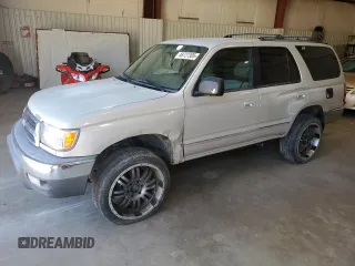 2000 Toyota 4Runner SR5 with VIN JT3GN86R4Y0165831, listed as a Copart auction lot 48727305 with 221,213 mi miles and Salvage Title. Bid and sale history available at DreamBid. Image 1.