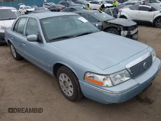 2005 Mercury Grand Marquis GS with VIN 2MEFM74W45X629662, listed as a IAAI auction lot 42075152 with 65,941 mi miles and . Bid and sale history available at DreamBid. Image 1.