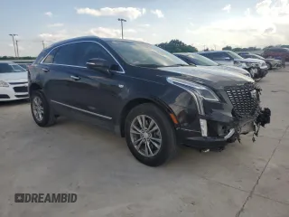 2021 Cadillac XT5 FWD Premium Luxury z VIN 1GYKNCR41MZ174477, wystawiony jako Copart lot #54335615 z przebiegiem 39 158 mil mil oraz Szkody całkowita. Historia ofert i sprzedaży dostępna na DreamBid. Obrazek 4.