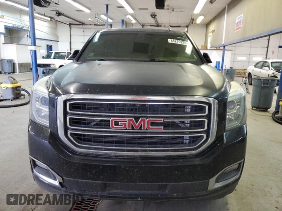 2015 GMC Yukon SLE with VIN 1GKS2AKC6FR229744, listed as a Copart auction lot 88270295 with 215,762 mi miles and Salvage Title. Bid and sale history available at DreamBid. Image 5.