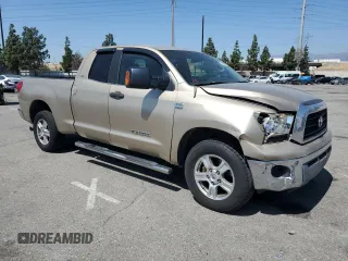 2007 Toyota Tundra SR5 with VIN 5TBRT54167S450458, listed as a Copart auction lot 52242335 with 179,283 mi miles and Salvage title. Bid and sale history available at DreamBid. Image 4.