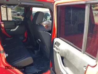 2018 Jeep Wrangler Unlimited Sahara z VIN 1C4HJWEG6JL893798, wystawiony jako IAAI lot #42299351 z przebiegiem Nie podano mil oraz . Historia ofert i sprzedaży dostępna na DreamBid. Obrazek 8.