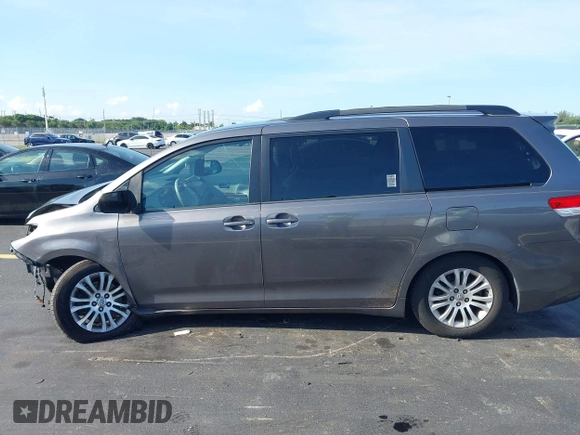 2011 Toyota Sienna XLE AAS with VIN 5TDYK3DC9BS117594, listed as a IAAI auction lot 42553026 with 156,808 mi miles and . Bid and sale history available at DreamBid. Image 15.