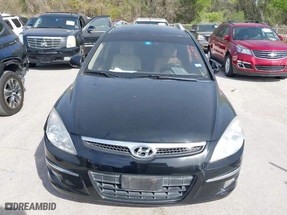 2012 Hyundai Elantra Touring SE with VIN KMHDC8AEXCU139403, listed as a IAAI auction lot 41862954 with 116,661 mi miles. Bid and sale history available at carsss.com. Image 6.