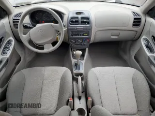 2002 Hyundai Accent GL z VIN KMHCG45C12U355561, wystawiony jako Copart lot #54546945 z przebiegiem 22 893 mil mil oraz Szkody całkowita. Historia ofert i sprzedaży dostępna na DreamBid. Obrazek 8.