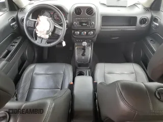 2015 Jeep Patriot Latitude with VIN 1C4NJRFBXFD176250, listed as a Copart auction lot 58903295 with 72,675 mi miles and Salvage title. Bid and sale history available at DreamBid. Image 8.