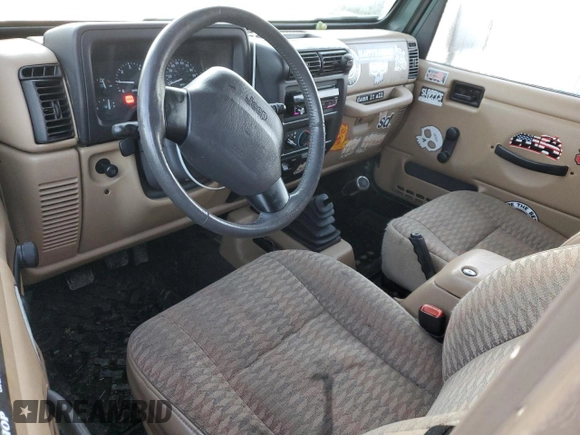 2000 Jeep Wrangler Sport with VIN 1J4FA49S1YP748529, listed as a Copart auction lot 77041924 with 154,949 mi miles and Salvage Title. Bid and sale history available at carsss.com. Image 8.