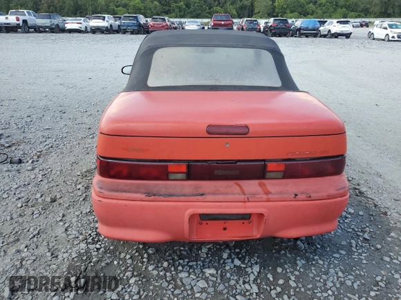 1992 Geo Metro z VIN JG1MR3369NK219164, wystawiony jako Copart lot #69017534 z przebiegiem 76 098 mil mil oraz Szkody całkowita. Historia ofert i sprzedaży dostępna na DreamBid. Obrazek 6.
