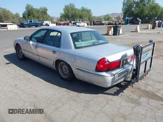 2002 Mercury Grand Marquis LS Premium z VIN 2MEFM75W82X653148, wystawiony jako IAAI lot #42307985 z przebiegiem 92 233 mil mil oraz . Historia ofert i sprzedaży dostępna na DreamBid. Obrazek 3.