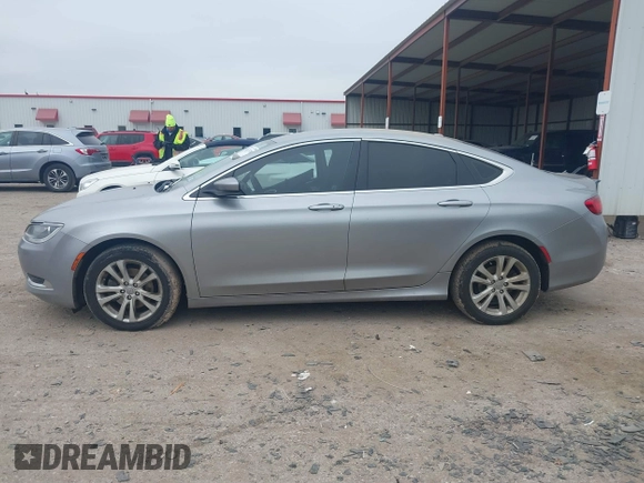 2015 Chrysler 200 Limited with VIN 1C3CCCAB7FN670991, listed as a IAAI auction lot 41625738 with 194,534 mi miles and . Bid and sale history available at DreamBid. Image 14.