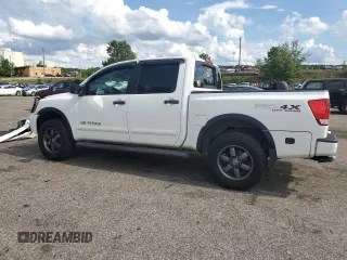 2012 Nissan Titan SV z VIN 1N6BA0EC2CN309207, wystawiony jako Copart lot #60451435 z przebiegiem 124 900 mil mil oraz Szkoda całkowita • Salvage title. Historia ofert i sprzedaży dostępna na DreamBid. Obrazek 2.