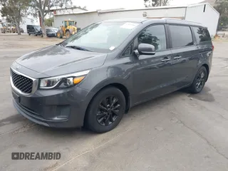 2016 Kia Sedona LX with VIN KNDMB5C11G6200986, listed as a IAAI auction lot 42047368 with 121,376 mi miles. Bid and sale history available at carsss.com. Image 2.