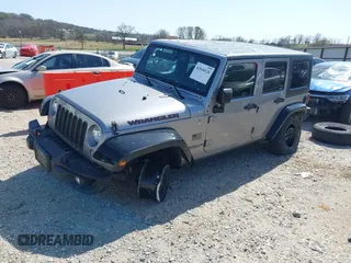 2015 Jeep Wrangler Unlimited Sport z VIN 1C4BJWDG0FL745533, wystawiony jako IAAI lot #41844126 z przebiegiem 151 620 mil mil oraz . Historia ofert i sprzedaży dostępna na DreamBid. Obrazek 2.