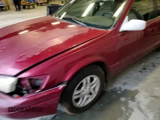 1997 Toyota Camry LE z VIN 4T1BG22K1VU033230, wystawiony jako Copart lot #52619265 z przebiegiem 301 543 mil mil oraz Szkoda całkowita • Salvage title. Historia ofert i sprzedaży dostępna na DreamBid. Obrazek 11.