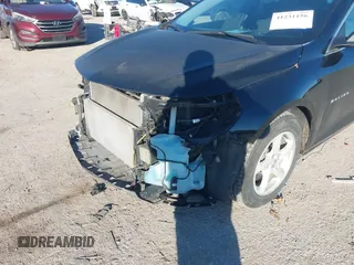 2016 Chevrolet Malibu LS z VIN 1G1ZB5STXGF240758, wystawiony jako IAAI lot #41231156 z przebiegiem 116 831 mil mil oraz . Historia ofert i sprzedaży dostępna na DreamBid. Obrazek 6.