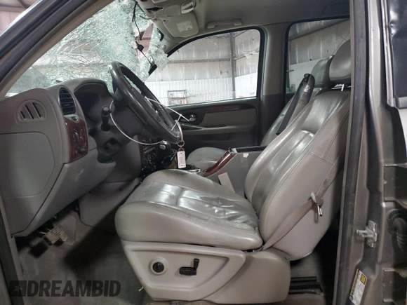 2005 GMC Envoy SLT z VIN 1GKDT13S652287033, wystawiony jako Copart lot #52508925 z przebiegiem 170 434 mil mil oraz Szkoda całkowita • Salvage title. Historia ofert i sprzedaży dostępna na DreamBid. Obrazek 7.