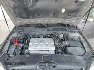 2001 Cadillac DeVille DTS with VIN 1G6KF57911U263913, listed as a IAAI auction lot 41744490 with 100,235 mi miles. Bid and sale history available at carsss.com. Image 10.