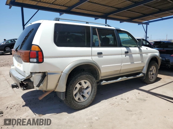 2002 Mitsubishi Montero XLS z VIN JA4MT31R42J048762, wystawiony jako Copart lot #54794835 z przebiegiem 124 978 mil mil oraz Czysty tytuł • Clean title. Historia ofert i sprzedaży dostępna na DreamBid. Obrazek 3.